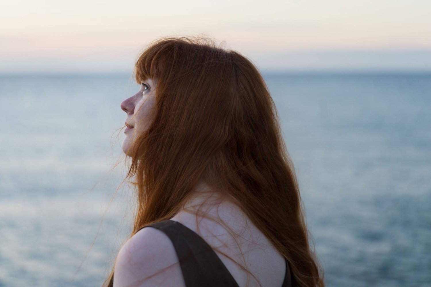 A close-up of a person at a sea