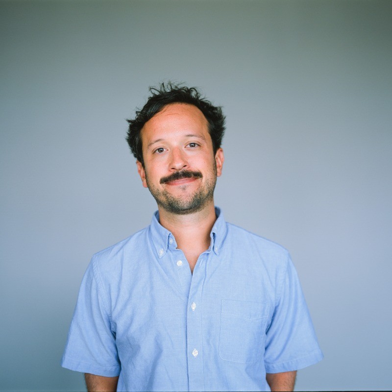 headshot of Dan DeCoste