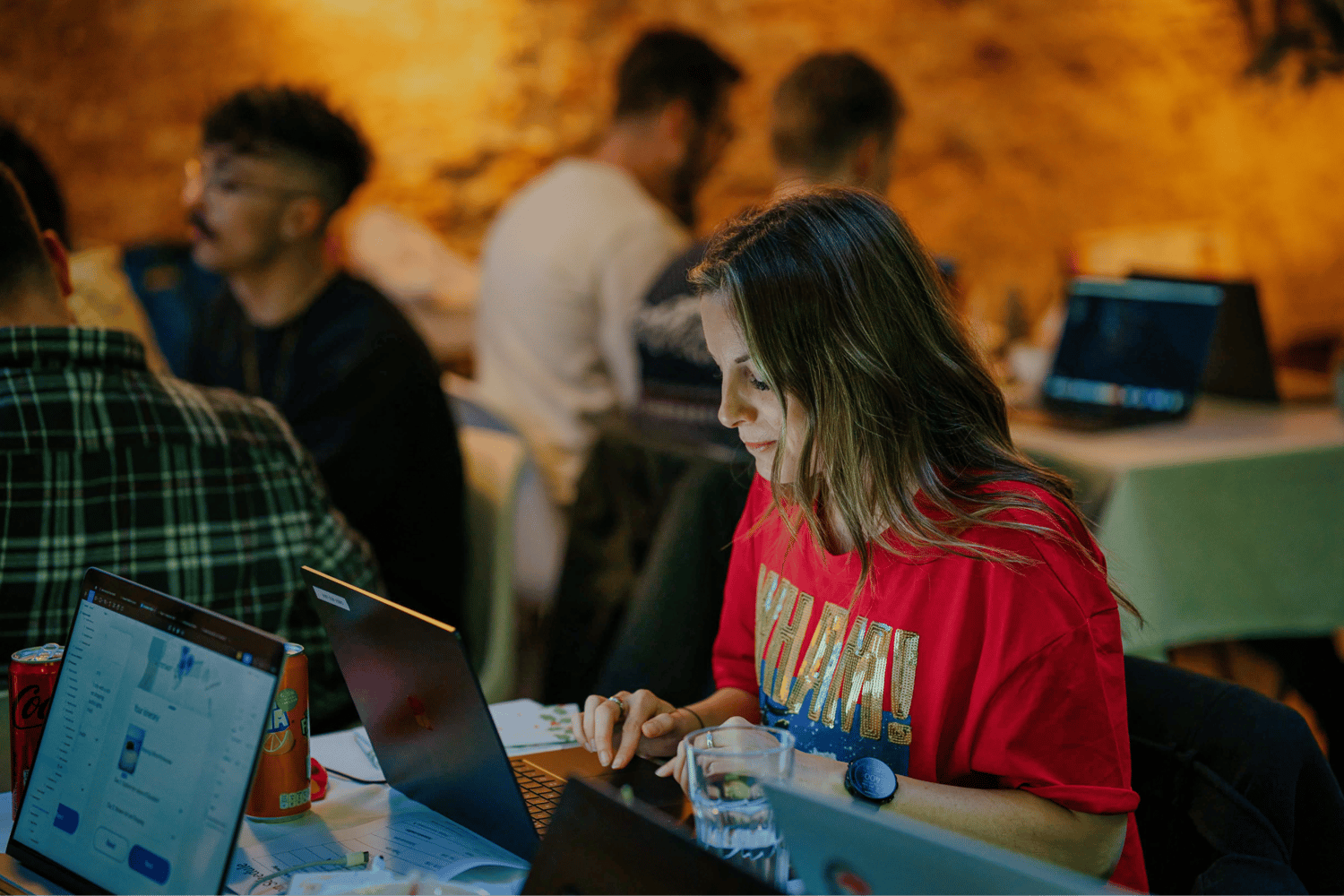 a person typing on their laptop