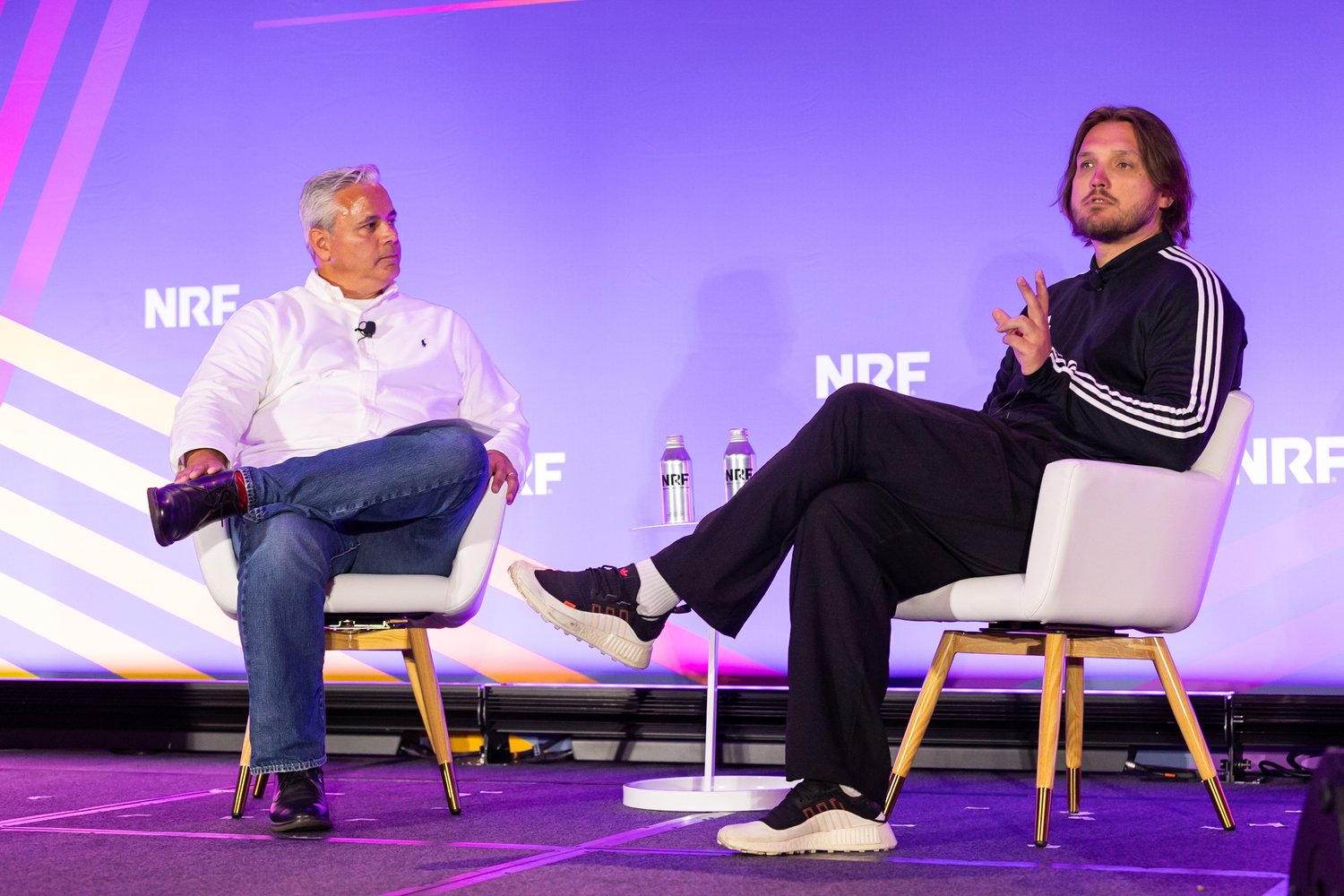 Mark Cibort (Reaktor) and Constantine Gavrykov (adidas) on a stage of NRF Nexus 2023