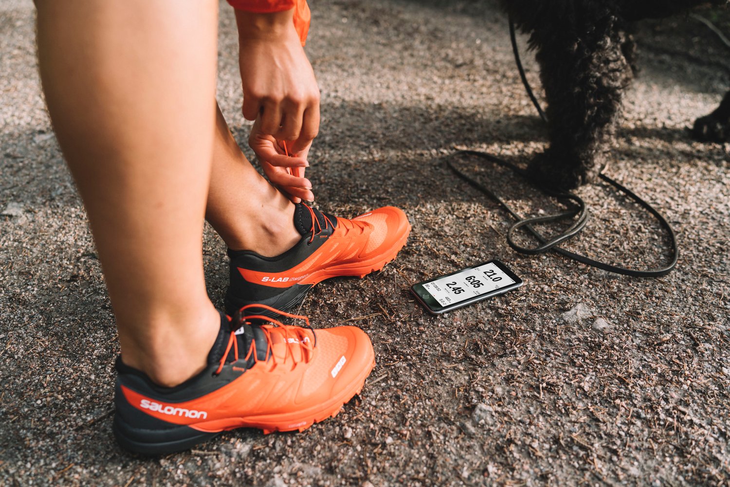 Phone on the ground with Sports Tracker app open